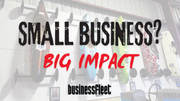 Vintage and modern Soap Box Derby cars displayed on a wall behind the words “Small Business? Big Impact” and the Business Fleet logo.