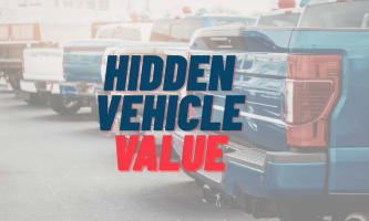 Pickup trucks in a row with overlay "Hidden Vehicle Value"