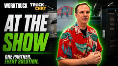 Promotional graphic for a TruckChat interview at an industry trade show featuring Mike Wade of E.J. Ward. Large text reads “At the Show” and “One Partner. Every Solution.” Wade stands beside fleet fueling or charging equipment, discussing integrated fleet technology and fuel management solutions.