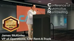 James McKinley stands on the stage during the 2026 CAR Conference and speaks about his acceptance of the Value Champion of the Year Award.
