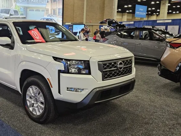 White Nissan Frontier on the NAFA expo floor.
