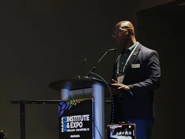 Al Curtis, fleet management director for Cobb County, Georgia, moderates on stage at NAFA I&E 2024.