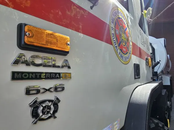 Up close look at badging on Acela Monterra 6x6 Tactical Truck