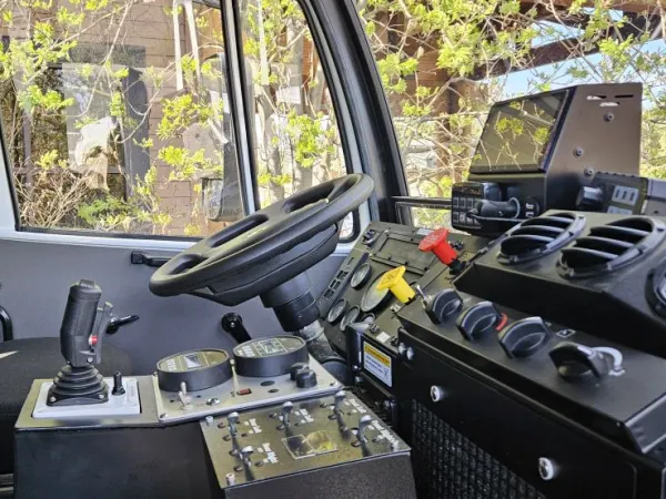 Interior cabin view of Monterra 6x6 looking out driver door