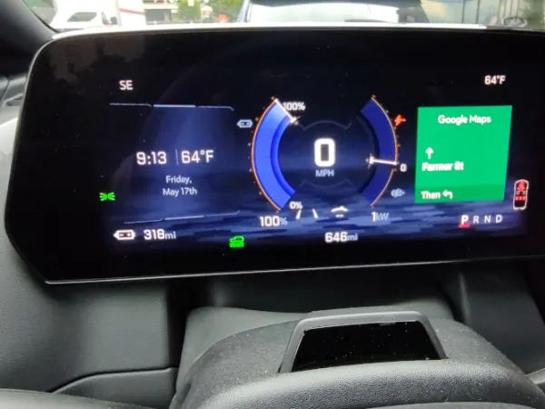 Close up of the information screen located just ahead of the steering wheel.