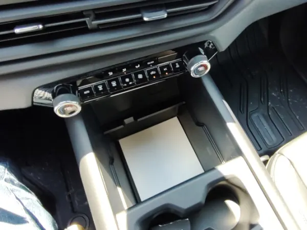 Open area with deep storage bin in front of the center console.