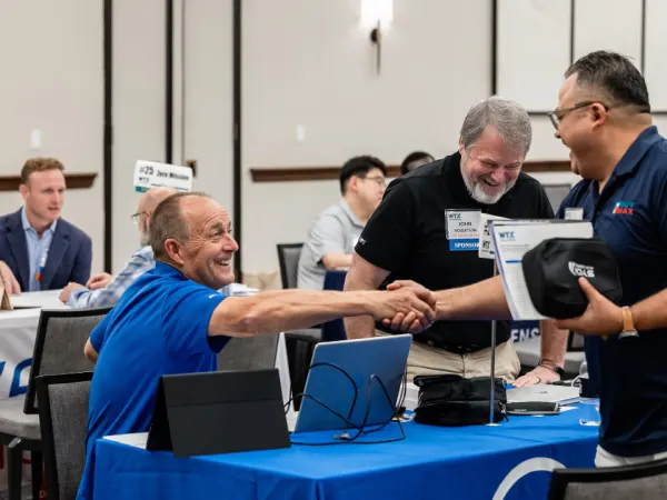 A handshake closes one meeting and opens the door to future opportunities.