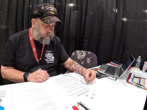 Man taking a test at a table.