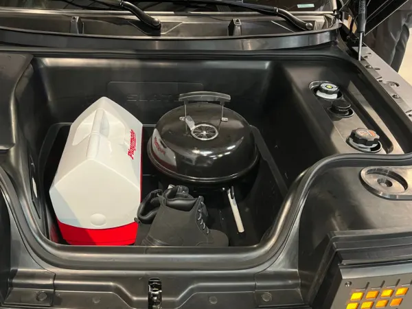 A frunk with a cooler inside.