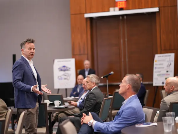 Man addresses conference attendees