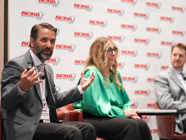 Seminar panelist makes a point