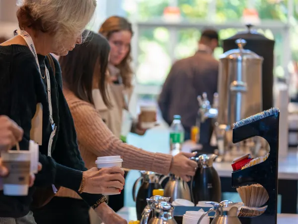 People pour coffee at FFC2026
