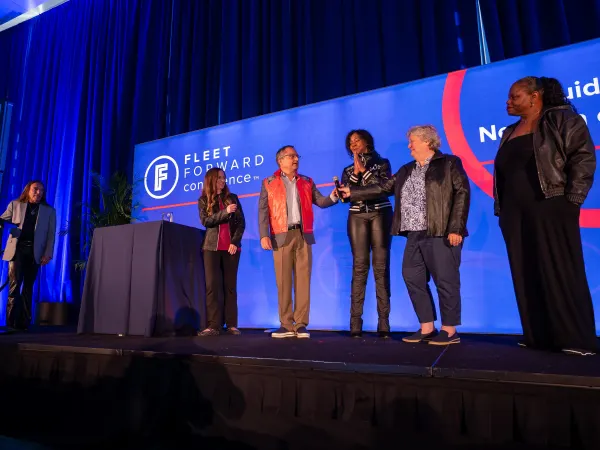 FFC2026 speakers and attendees ewear leather jackets on stage