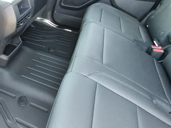 View of the floor area in the back seat.