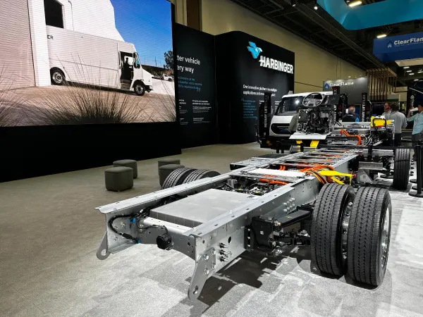 Commercial EV chassis on an expo floor. 