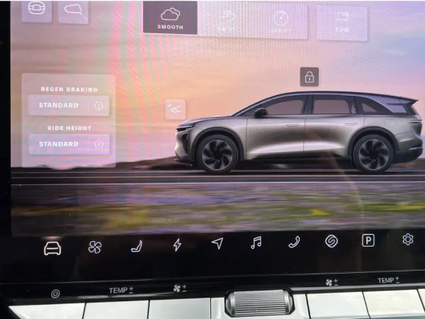 Main display page of iPad-style control panel shows pictures of a vehicle with drop-down menu options.