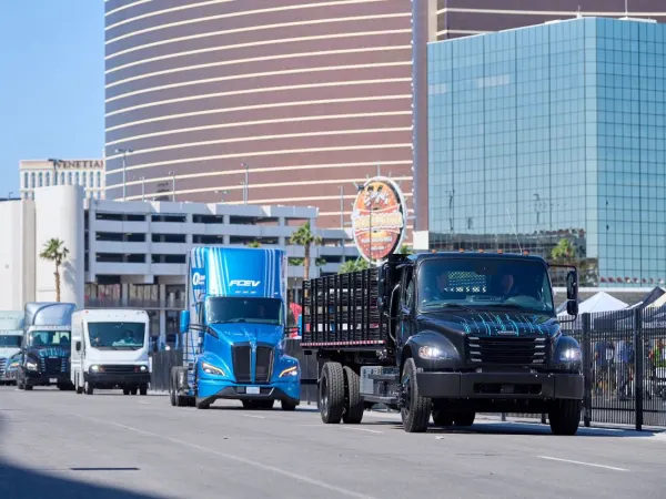 Various commercial electric vehicles outside the convention center in Las Vegas. 