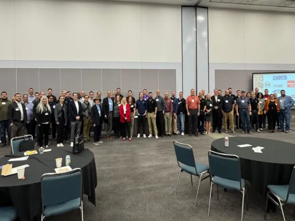 Group photo of NAFA chapter members in seminar hall.