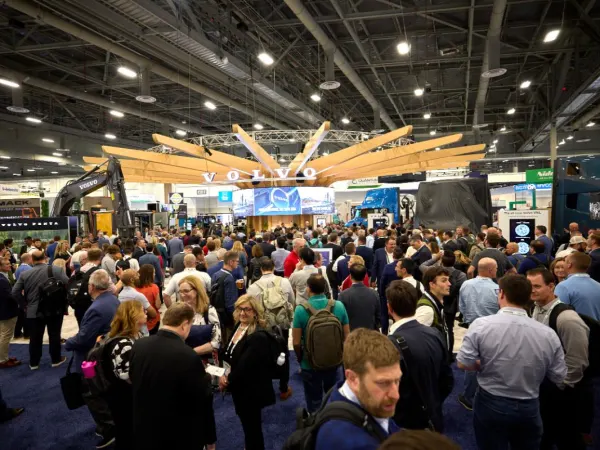 A crowded expo hall. 