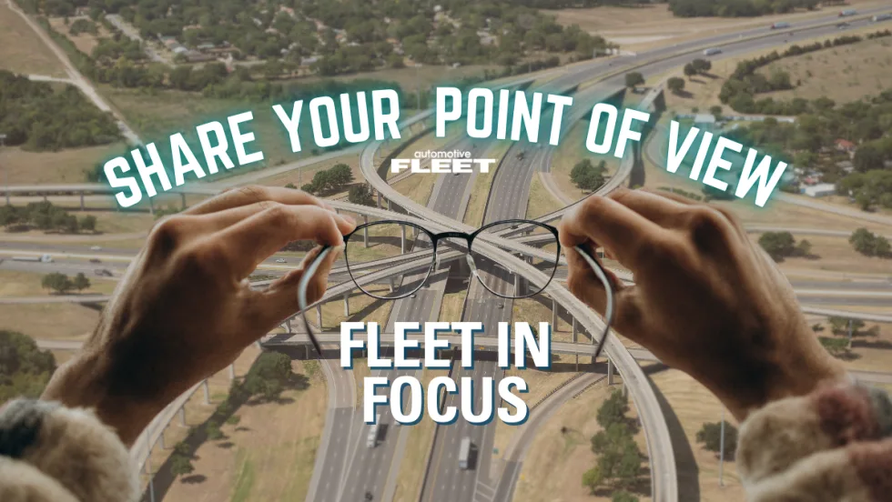 An aerial view of highway roads with hands in the foreground holding up glasses. Text reads "Share Your Point of View. Fleet in Focus".