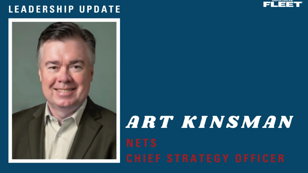 Portrait of Art Kinsman, newly appointed NETS Chief Strategy Officer, smiling in a suit jacket against a neutral background.