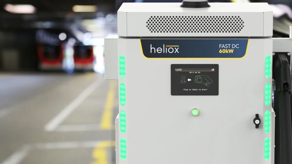 DC fast charge that looks like a large white box is located next to a parking area
