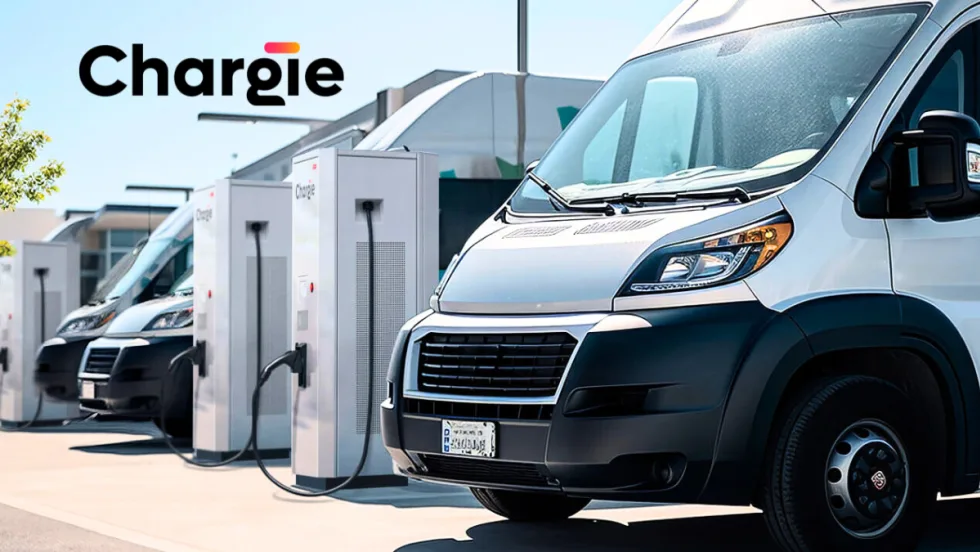 White electric vans plugged in for charging, company logo for Chargie in the upper left of the image.