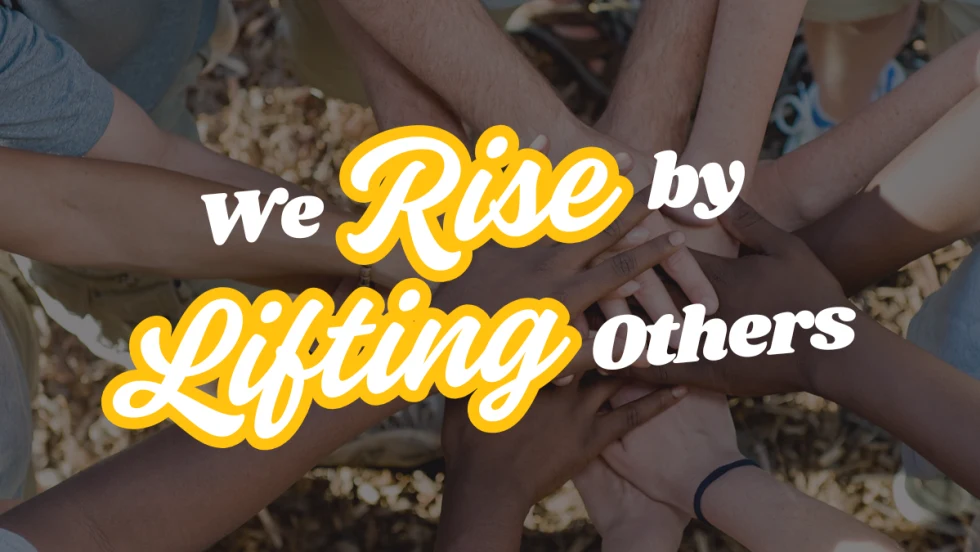 We Rise by Lifting Others with united hands in the background
