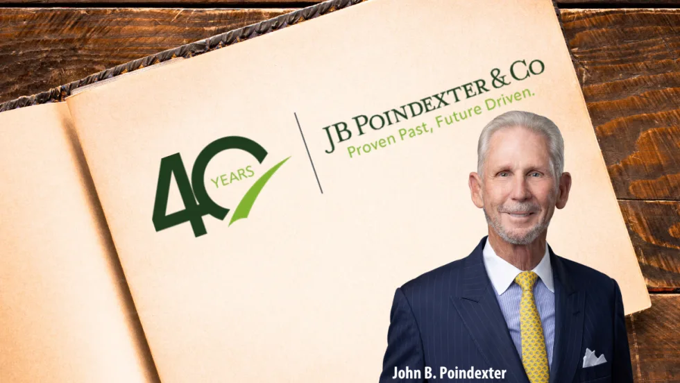 open book with text for 40th anniversary of a company and inset photo of the founder.