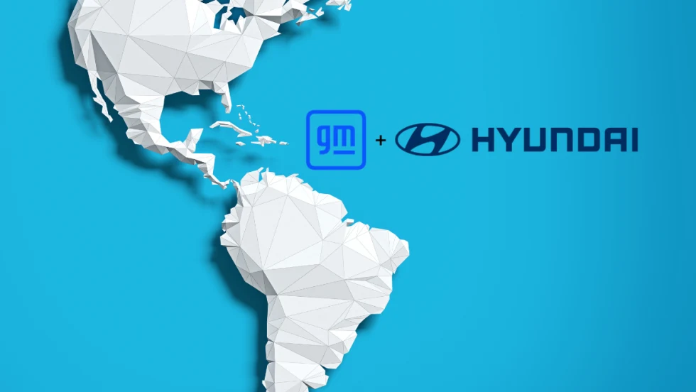 Map of the Americas with GM and Hyundai logos symbolizing partnership on electric commercial van production for North America.