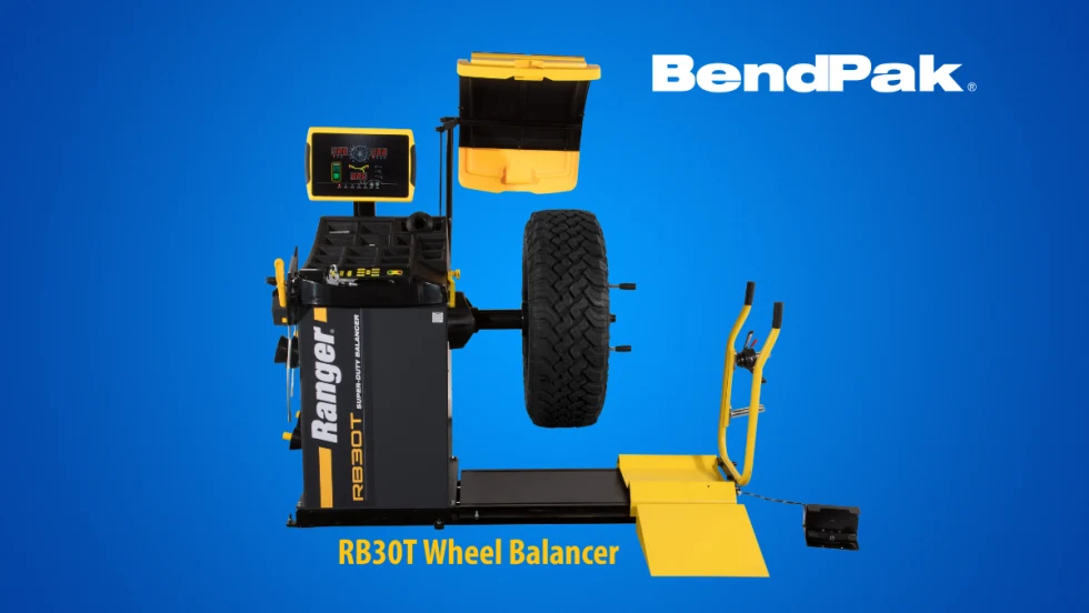 Tire balancing machine against a blue background with logo for BendPak and a small headline that says RB30T Wheel Balancer.