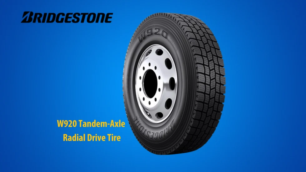 Truck tire against a blue background with inset Bridgestone logo and yellow text with the name of the tire.