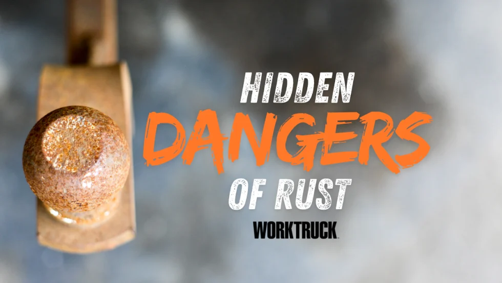 Rusty trailer hitch ball showing corrosion risks and hidden dangers of rust in work truck fleets.