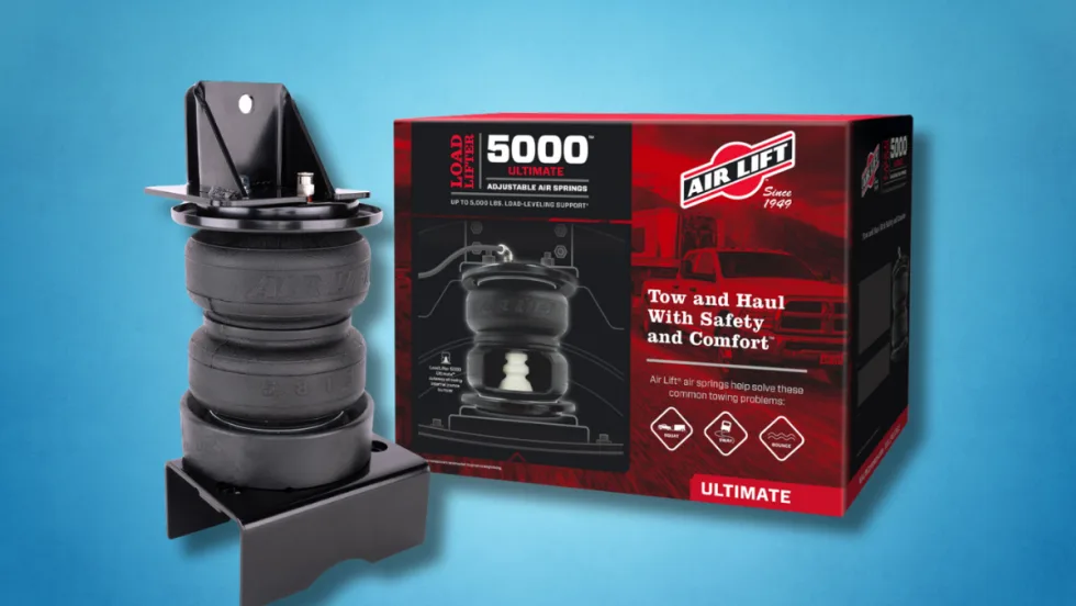 Air Lift LoadLifter 5000 Ultimate air spring kit shown next to retail packaging.