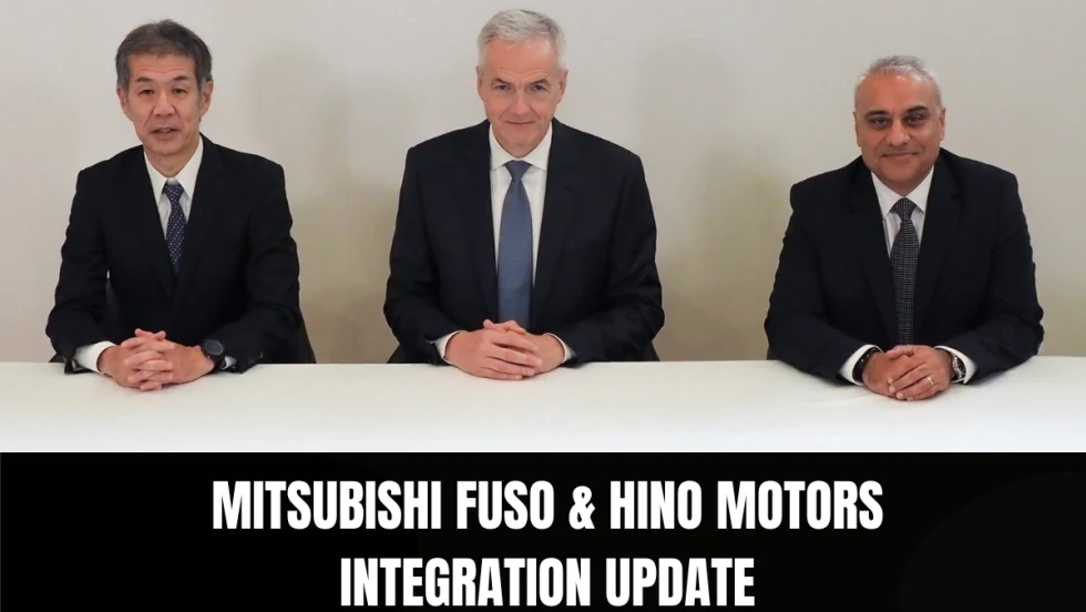 Three executives seated at a table — Satoshi Ogiso of Hino Motors, Karl Deppen of Mitsubishi Fuso, and Hetal Laligi of Mitsubishi Fuso — announcing updates on the ARCHION Corporation integration plan 