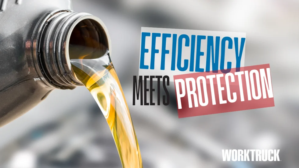Close-up of golden motor oil being poured from a container, illustrating modern low-viscosity lubricants that improve fuel economy and engine protection for heavy-duty fleets.