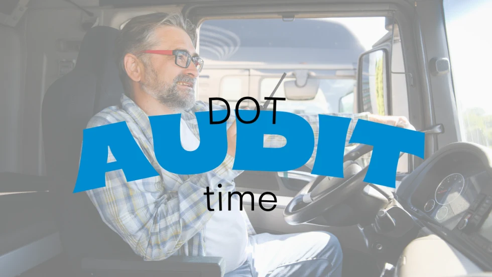 Driver sitting in a truck cab preparing paperwork with the words “DOT Audit Time” overlayed, illustrating the importance of compliance and understanding audit violations.