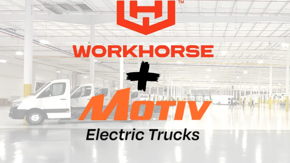 Workhorse and Motiv Electric Trucks logos displayed over a medium-duty truck production facility, representing the companies’ proposed merger.