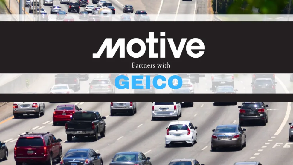 background image of highway traffic with black strip across middle and white logo for Motive with words Partners With and blue text GEICO.