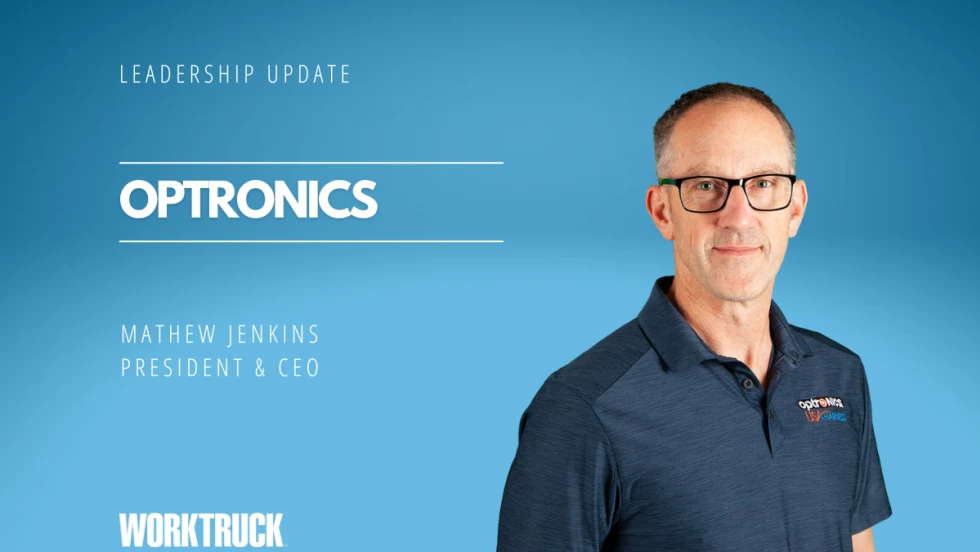 Blue background with headline for Leadership Update and Optronics with inset photo of a man in a short sleeve shirt.
