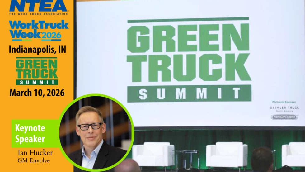 Image of Green Truck Summit on a projection screen on a stage, inset photo of man in circle who will be the keynote speaker.