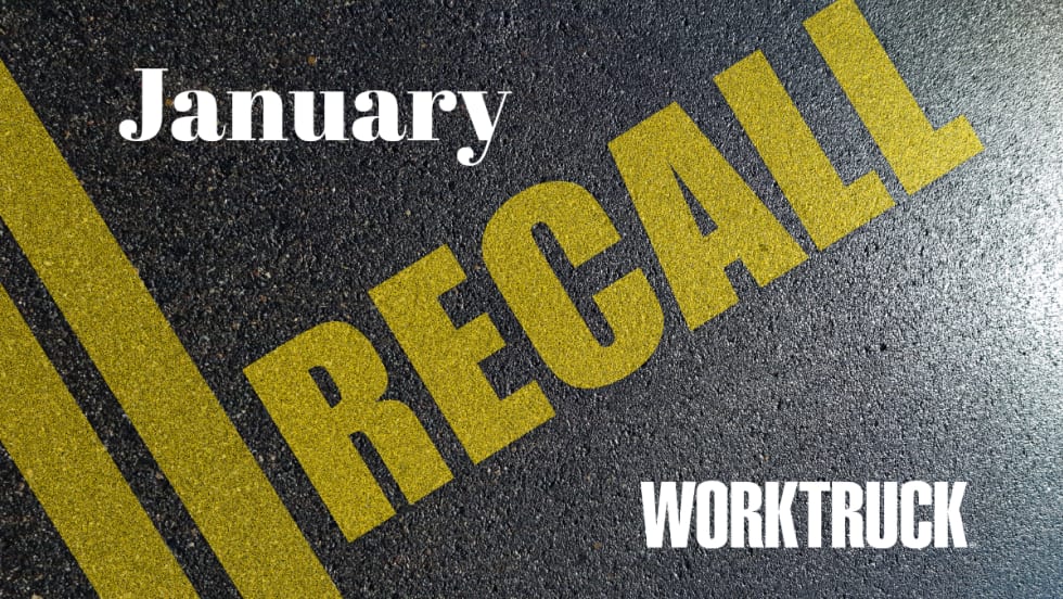 Pavement background with double yellow lines and large text that says Recall, January, and Work Truck logo.