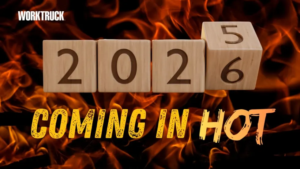 Wooden blocks showing “2026” in front of flames with the words “Coming in Hot,” symbolizing a high-pressure year of change for fleet planning and operations.