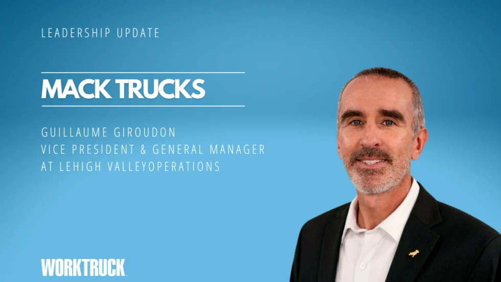 Man in business attire against a blue background with headline for Leadership Update, Mack Trucks, and the man's name and title.