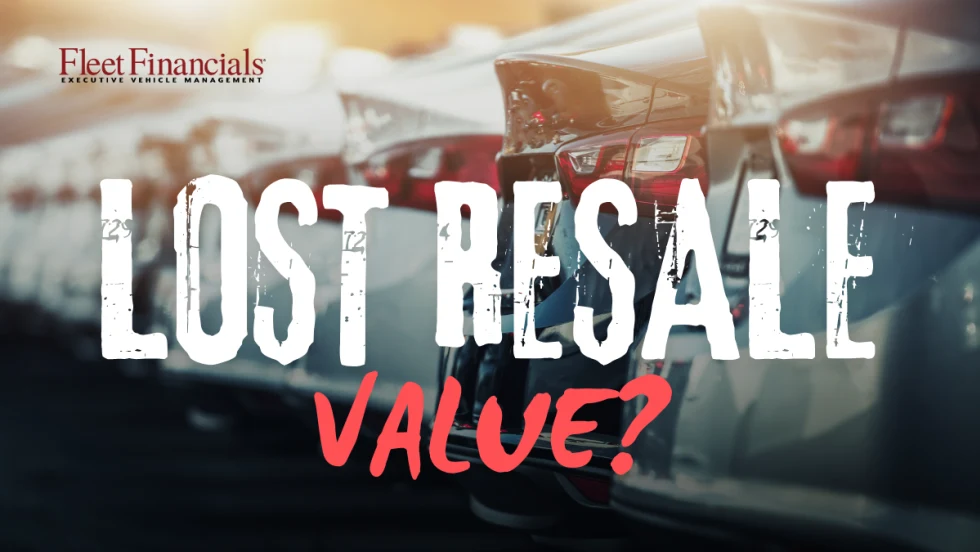 Fleet vehicles lined up for resale with text reading “Lost Resale Value?” illustrating how technology, maintenance, and safety investments are often not reflected in residual values.