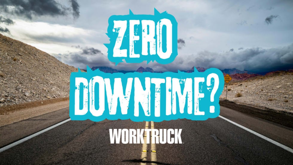 “Zero Downtime” graphic over an open highway road, symbolizing Ford Pro’s strategy to reduce fleet downtime through connected vehicle data and service integration.