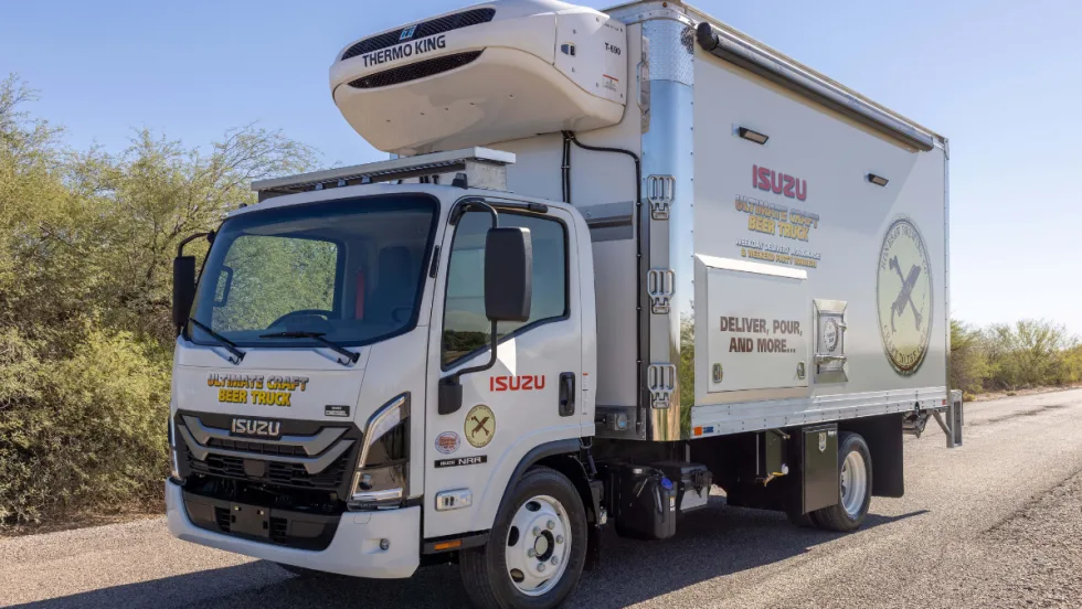 The Isuzu Craft Beer truck with Wrapmate Graphics driving down the street