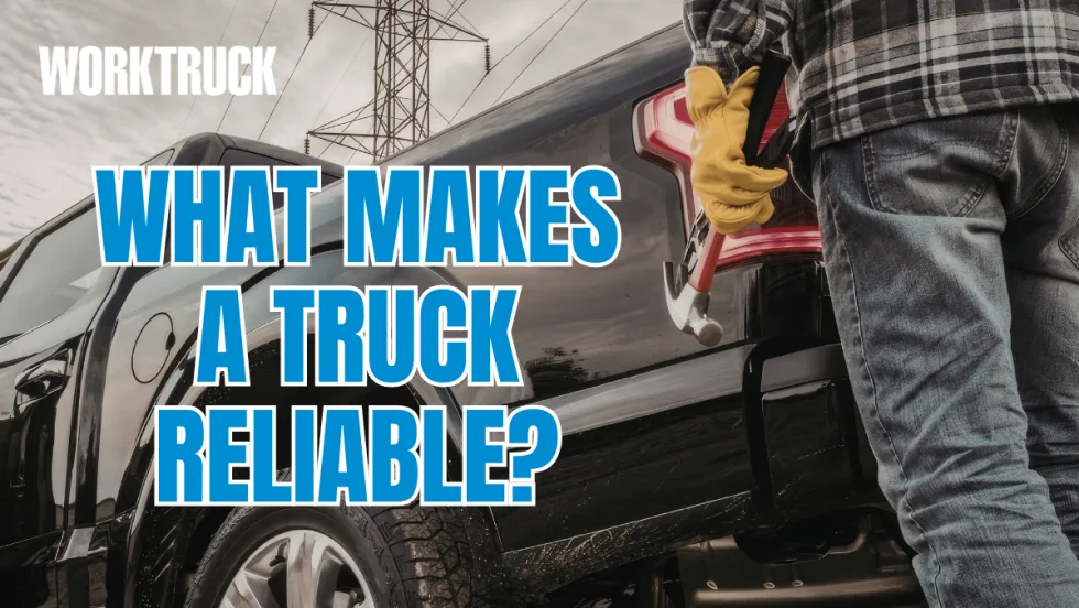 Technician standing beside a work truck holding a hammer, with text “What makes a truck reliable?” overlaid