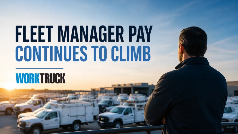 Fleet manager overlooking a lot of work trucks at sunrise, representing rising pay and growing demand for fleet leadership roles.