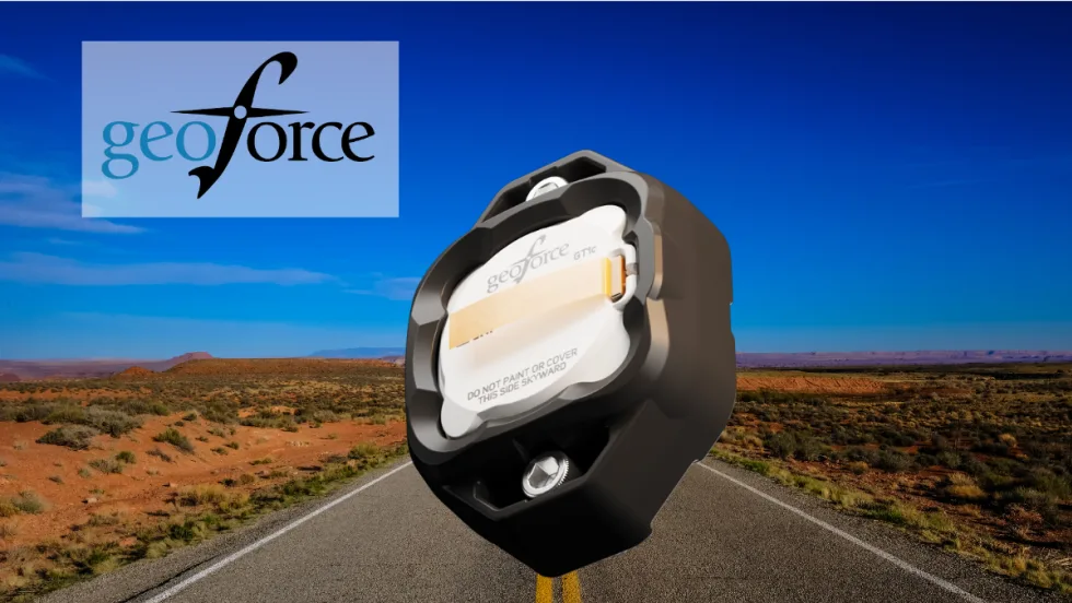 Asset tracker against background image of a remote desert highway, and logo upper left for Geoforce.